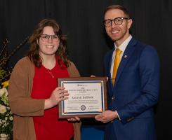 Lauren Baldwin receiving award